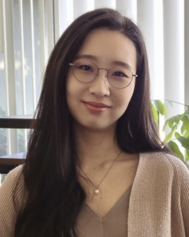 Image of a woman wearing wire rimmed glasses looking at the camera and smiling. If you are worried about your teen, they can get help in therapy for teens in Los Angeles, CA. 91108 | 90232