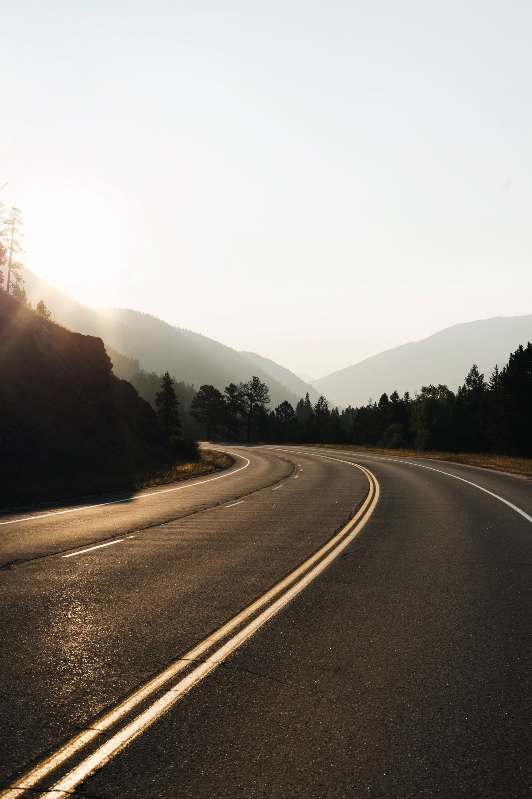 Image of a road winding around a corner. Experiencing burnout can feel like you are on a never-ending road. Working with a burnout therapist for burnout treatment and work stress management in Los Angeles, CA can help. | 90504 | 90505