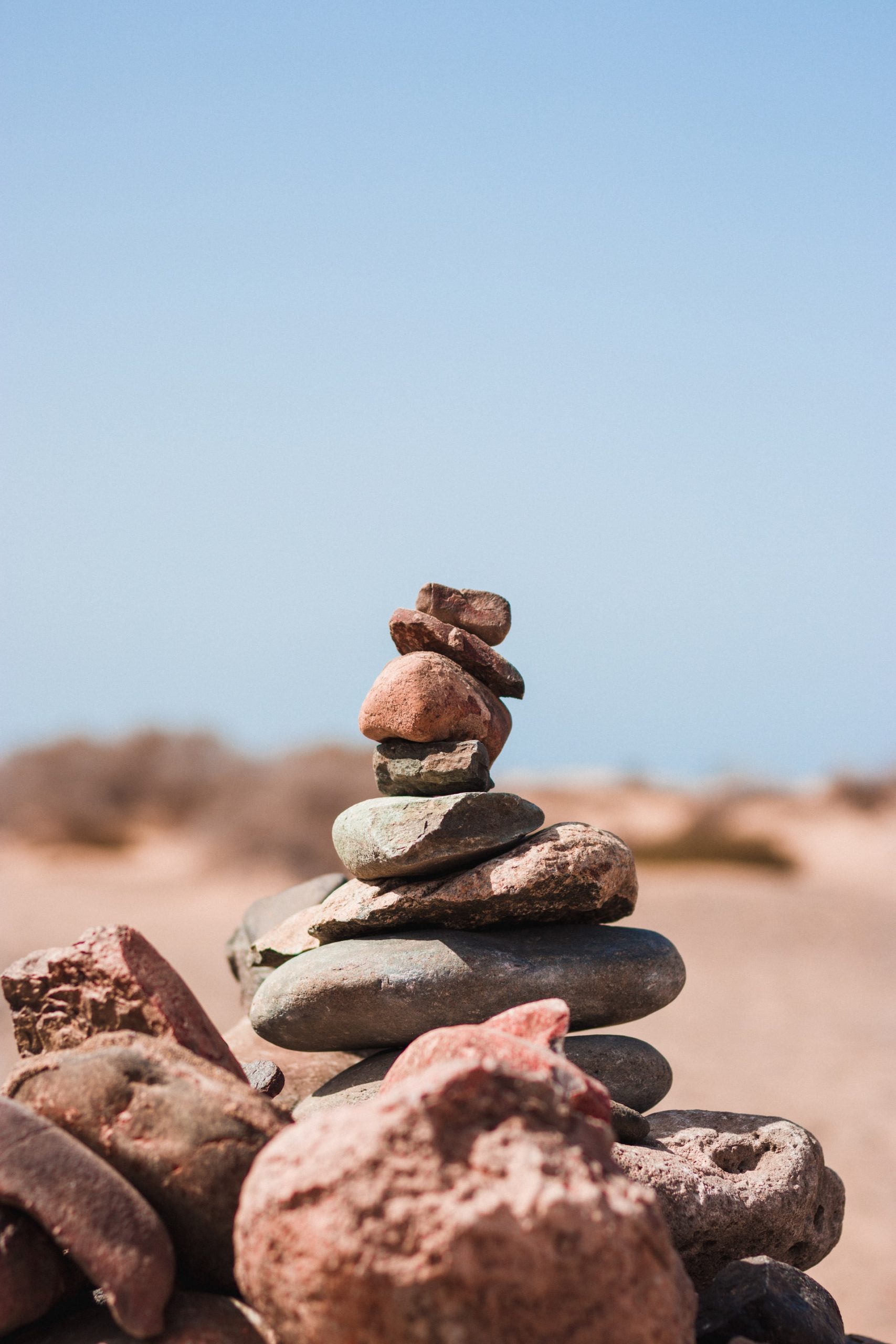Image of rocks placed one on top of the other. Those struggling with anxiety may feel like they are doing a balancing act. Anxiety treatment in Los Angeles, CA can help treat anxiety. | 90904 | 90503