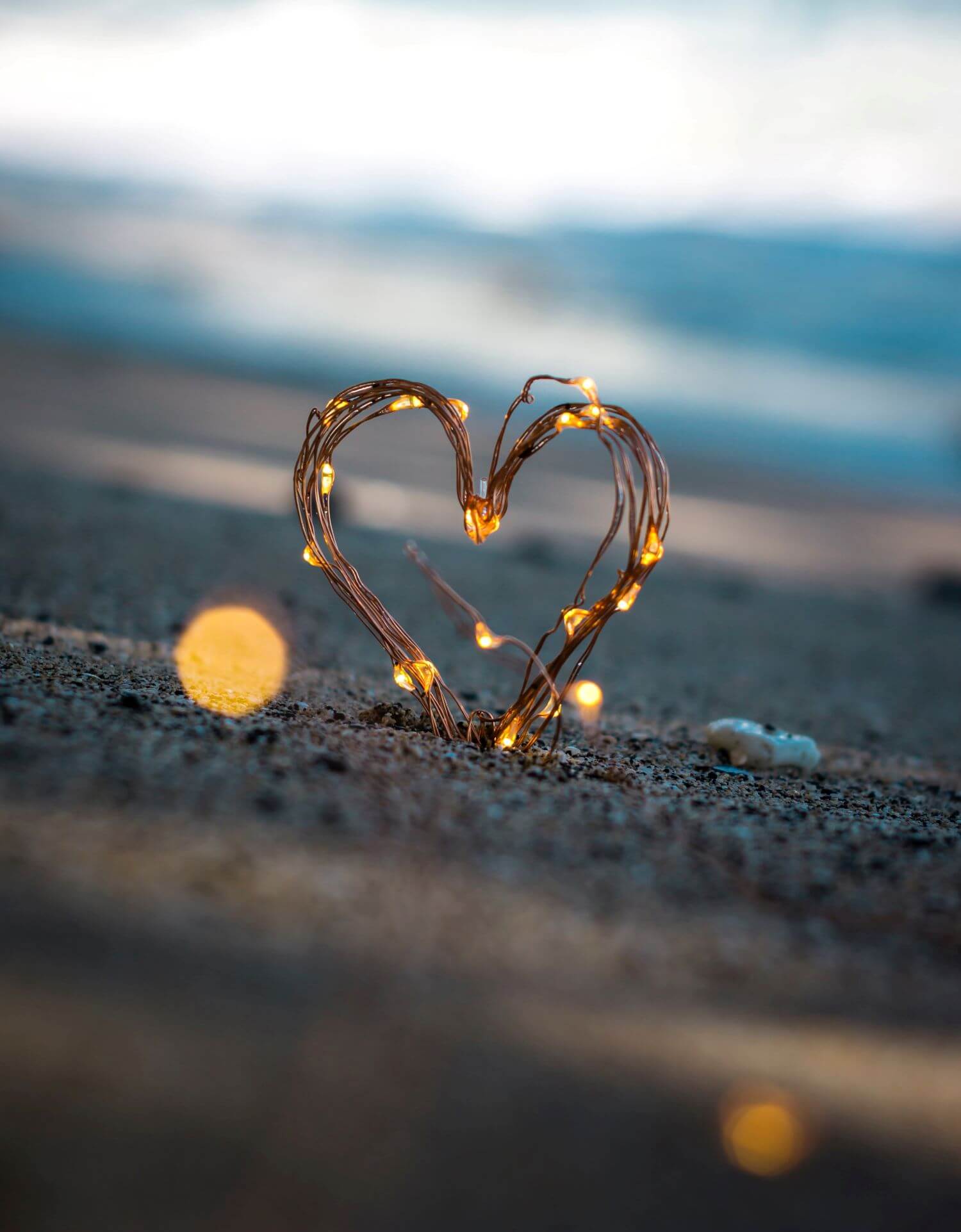Image of a heart made of string lights perched on top of sand. This image illustrates how seeing a marriage counselor in Los Angeles, CA can help couples try to work through problems. Couples therapy in Los Angeles, CA not only helps couples with problems, but strengthens relationships, too. | 90504 | 90505