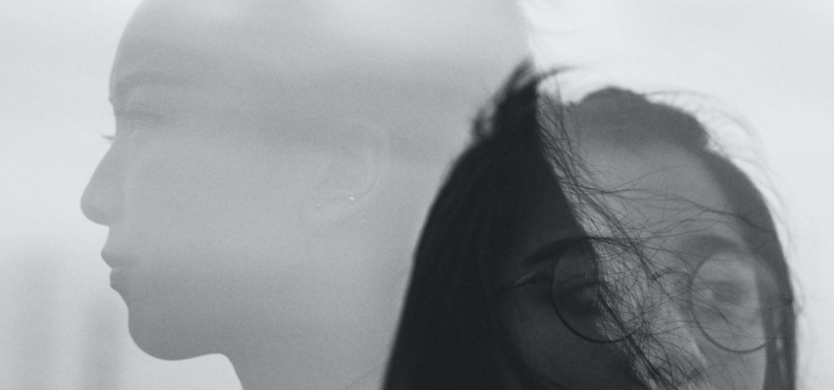 Asian American Woman in Black and White. If you are struggling with the asian american experience, our asian therapists in Los Angeles, CA can help. We have therapy for asian women in Los Angeles, CA. (90404, 90503, 91006.)