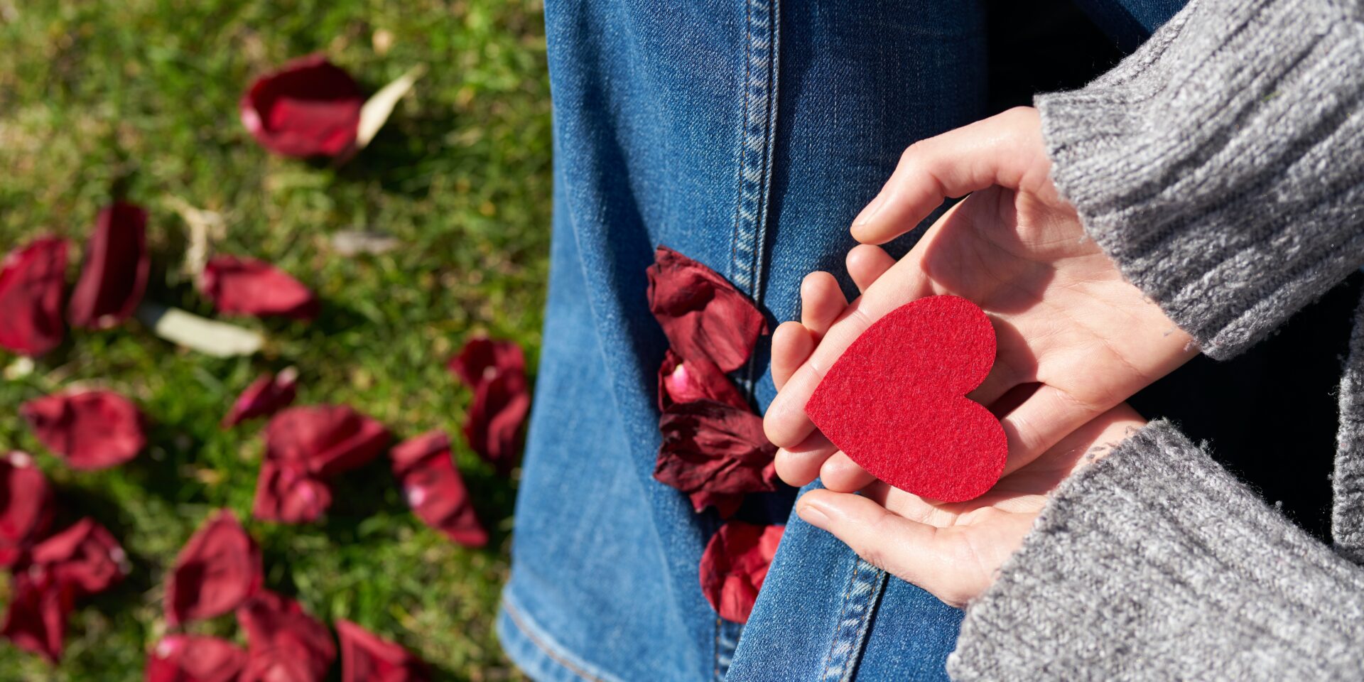 A close up of a person holding a heart. This could represent the bonds cultivated through online therapy for asian americans. Learn more about the support an Asian American therapist in Los Angeles can offer by searching for an Asian American therapist near me today.