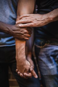 A close up of a person holding the arm of their partner in support. This could represent the support couples therapy and marriage counseling in los angeles, ca can offer for relationships. Learn more about online couples therapy in California by contacting an asian therapist in los angeles, ca today.
