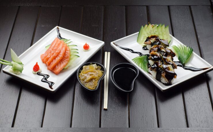 An image of two dishes of food on a table. Learn how an eating disorder support group in Los Angeles, CA can offer support with eating disordres. Search for an Asian American therapist near me or an asian american therapist in Los Angeles today.