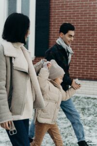 A family walks together while holding hands. Learn how an Asian American therapist in Los Angeles, CA can offer support with Asian therapy near me. Search for an Asian therapist near me today.
