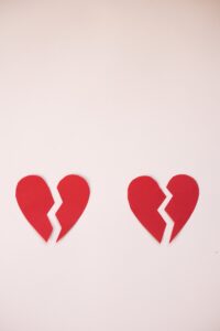 two broken hearts to represent breakups or heartbreak