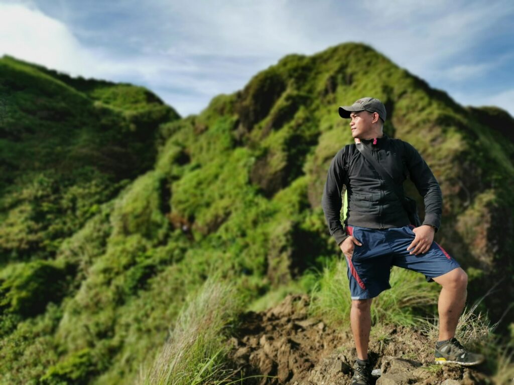 A man stands on a hiking trail while looking out at the landscape. Learn how a culturally sensitive therapist in Los Angeles, CA can offer support with Filipino family ties and mental health. Search for multicultural therapy in Los Angeles, CA by contacting an Asian therapist in California today.