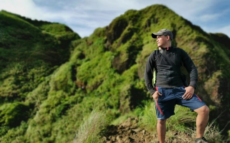 A man stands on a hiking trail while looking out at the landscape. Learn how a culturally sensitive therapist in Los Angeles, CA can offer support with Filipino family ties and mental health. Search for multicultural therapy in Los Angeles, CA by contacting an Asian therapist in California today.