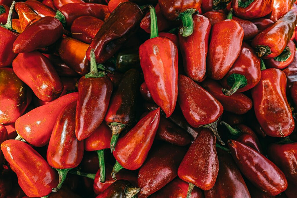 A close up of a pile of red peppers, representing strong emotions like anger. Learn how individual therapy in Los Angeles, CA can offer support with addressing emotions. Search for an Asian therapist in Los Angeles, CA and how online anxiety treatment in California can help today.