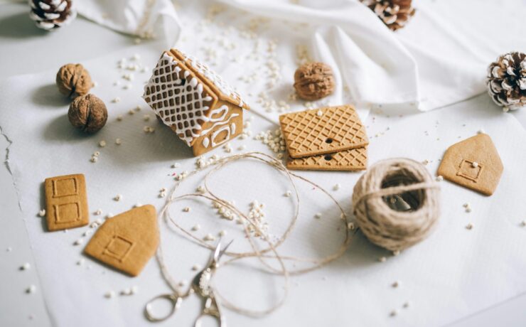 A close up of a gingerbread house and materials for a second home. Learn how a neurodiversity-affirming therapist in Los Angeles, CA can offer support during the holiday season. Search for neurodiverse affirming therapy Los Angeles, CA and how an online therapist in Los Angeles, CA can help.