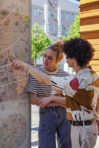stressed woman working | burnout therapist in los angeles, ca | anxiety treatment in los angeles, ca | individual therapy in los angeles, ca | 90048 | 91502 Free A couple examines a city map outdoors on a sunny day, pointing at destinations. Stock Photo