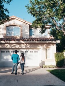 millennial couple buying house