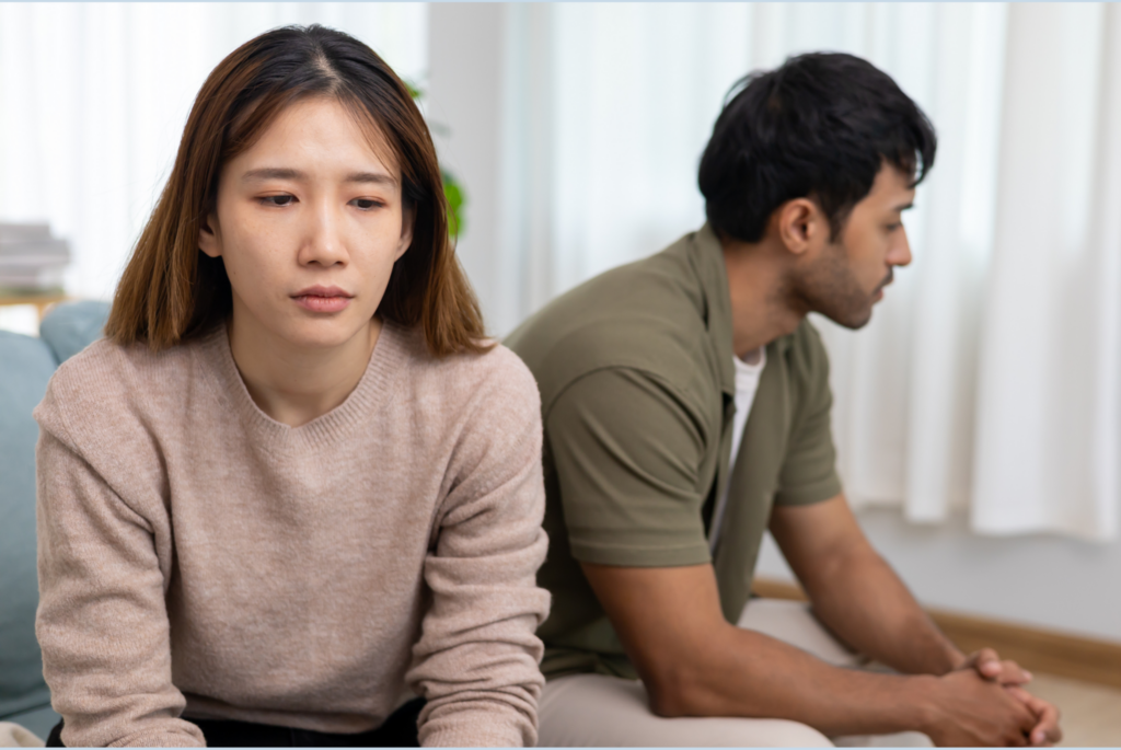 an upset asian couple