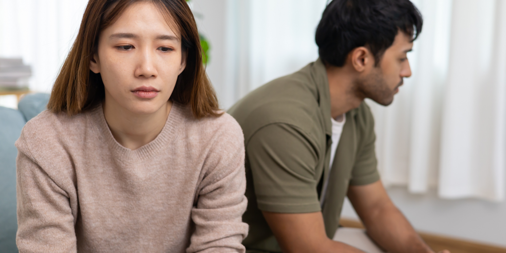 an upset asian couple