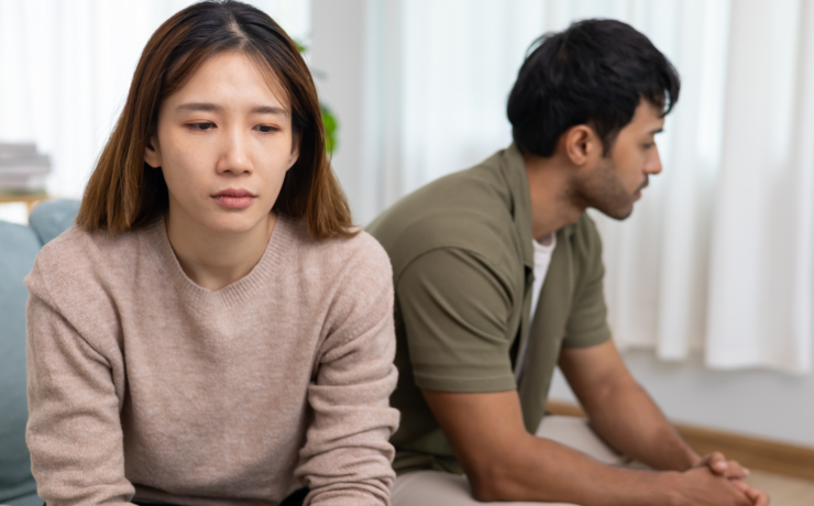 an upset asian couple