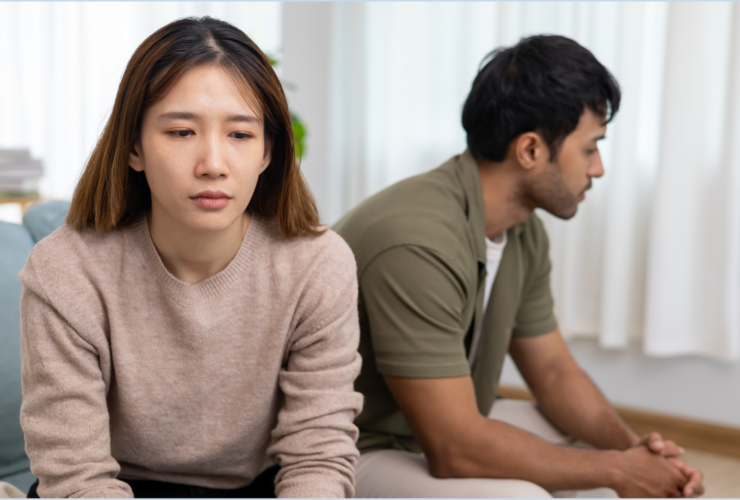 an upset asian couple